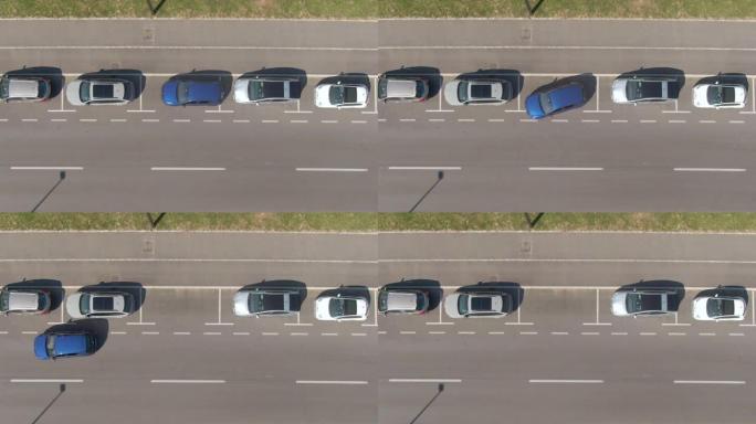 空中: 自动转向车辆将自己停放在一个空的路边停车位中。