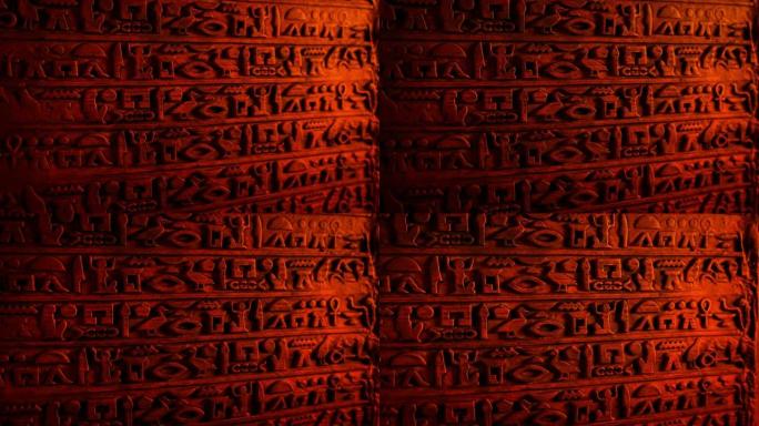火光中的古埃及墙残留灯光照射红色古建筑