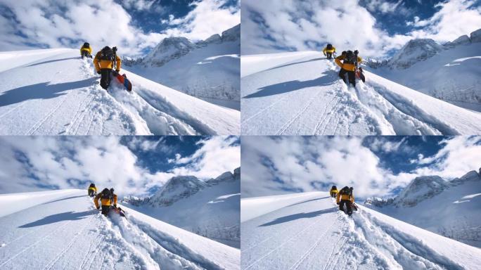 滑雪者爬上雪山探险爬山登山