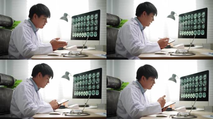 男性医生在笔记本电脑上进行视频通话