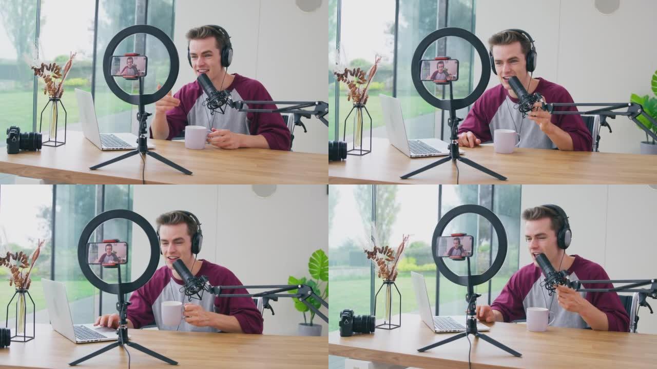 男性Vlogger戴耳机带麦克风手机直播
