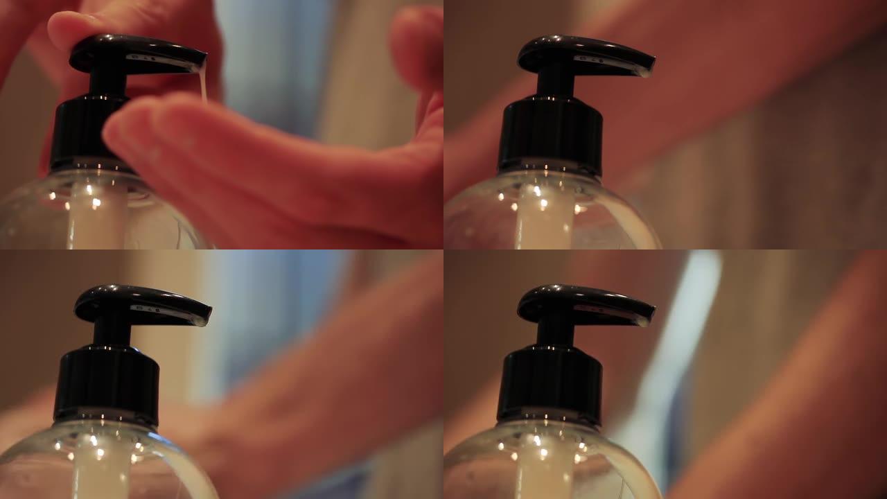 在新型冠状病毒肺炎全球流行期间，使用皂液器的人手。