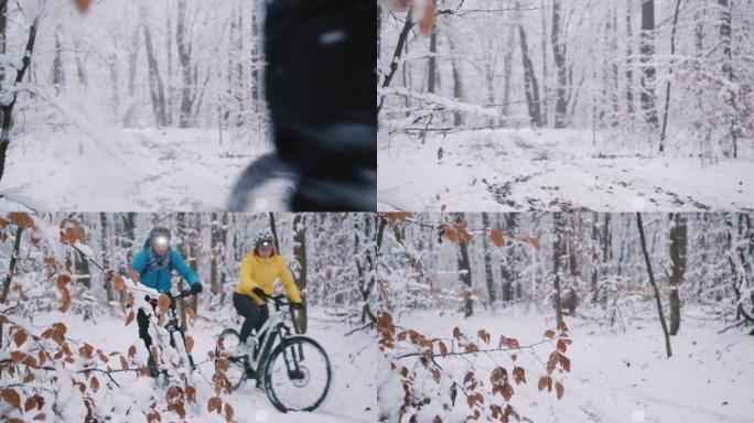 SLO MO夫妇带着前灯在白雪皑皑的森林小径上骑着自行车
