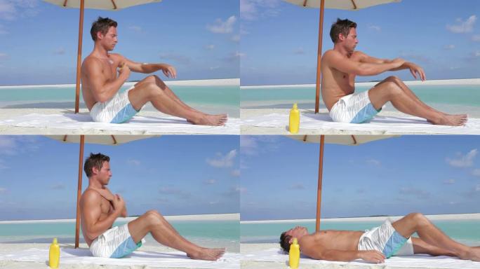 男子在海滩度假时使用防晒霜