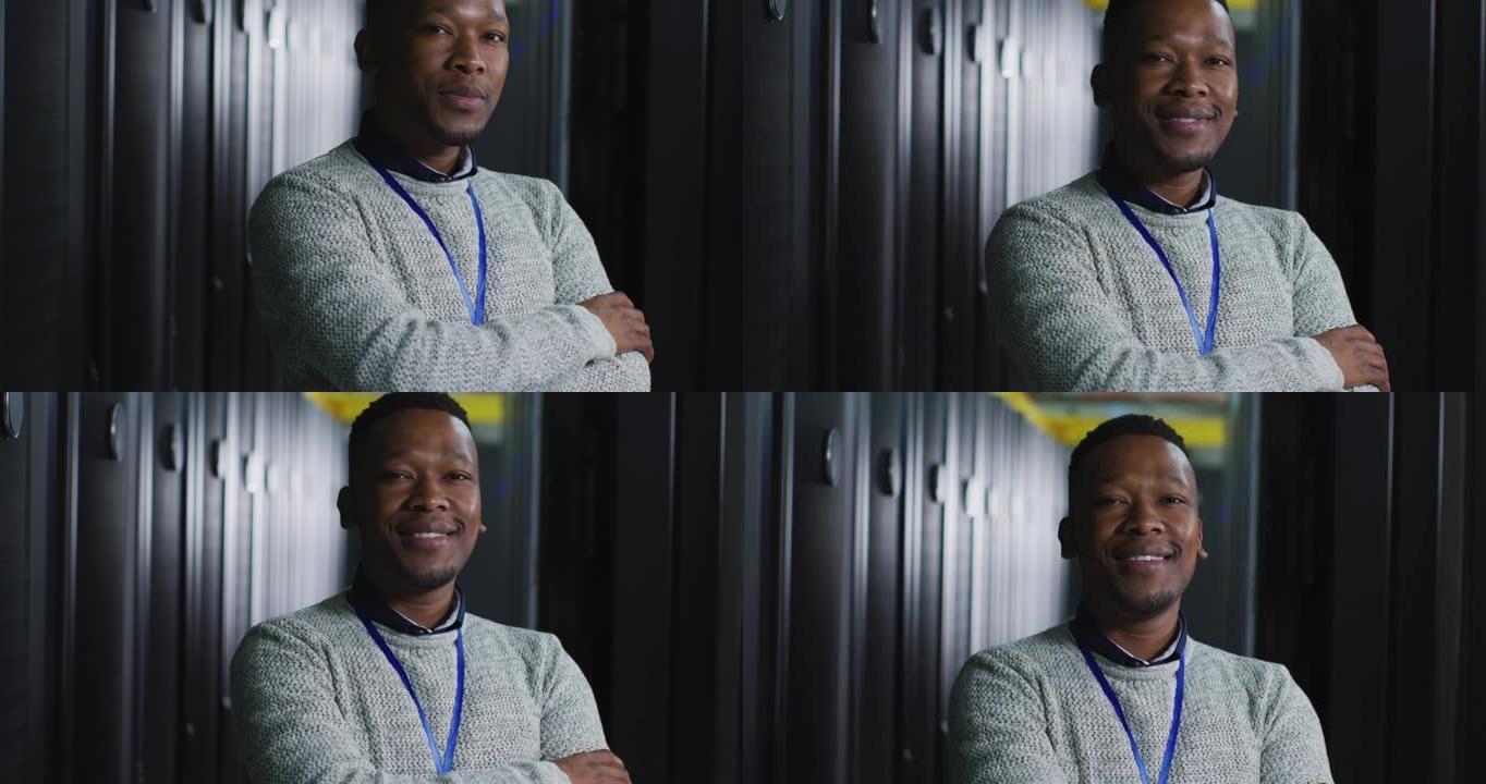 在商务服务器机房拥有安全通行证的非洲裔美国男性计算机技术员