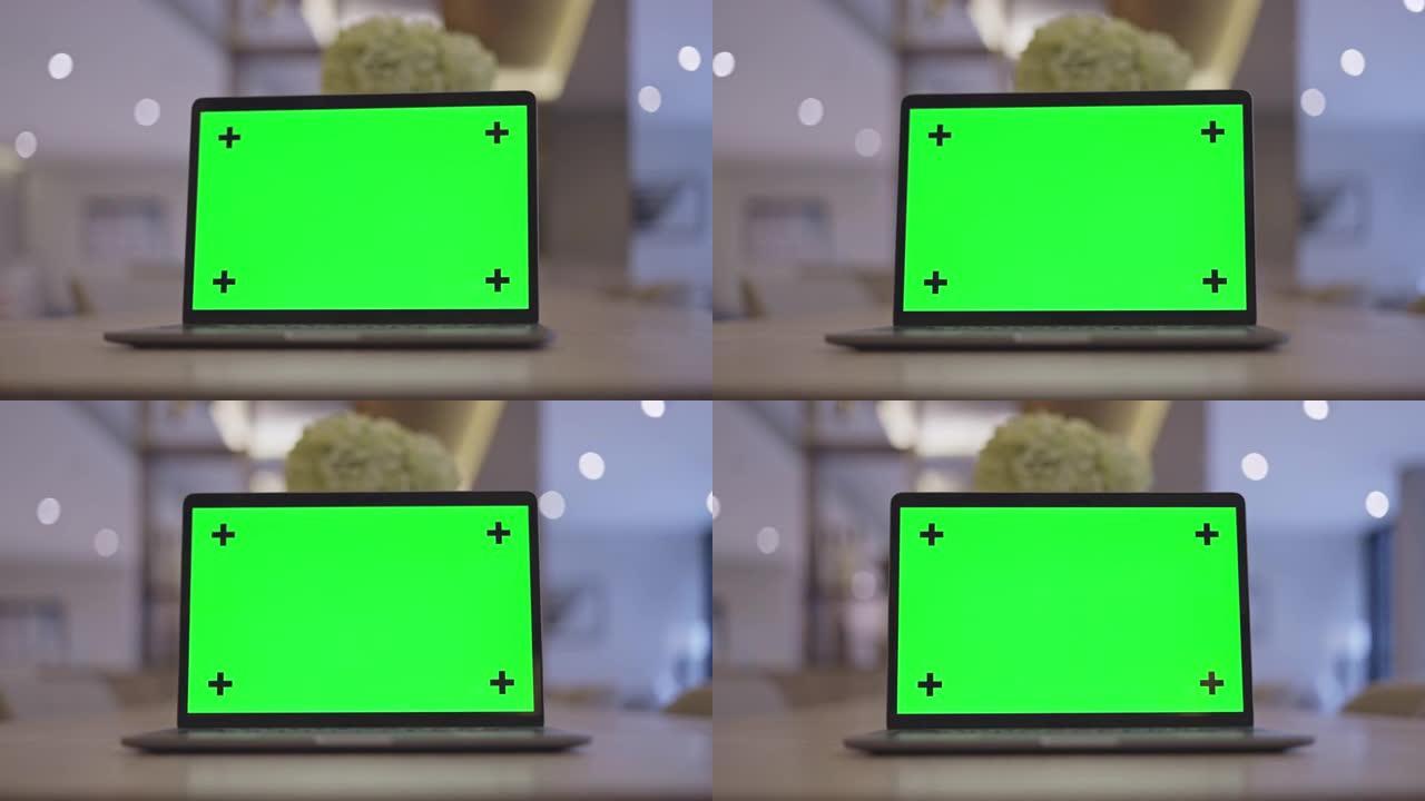 绿屏电脑笔记本电脑跟踪镜头，无人
