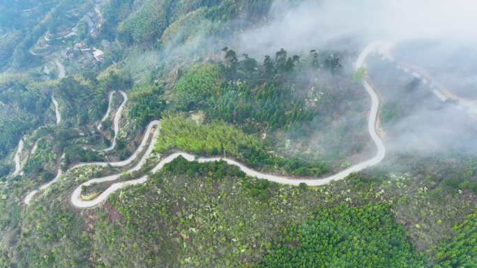 4K云雾缭绕山路村村通公路曲折道路