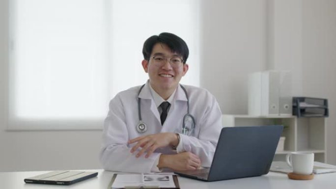 肖像头像快乐微笑亚洲男子医生医务工作者。