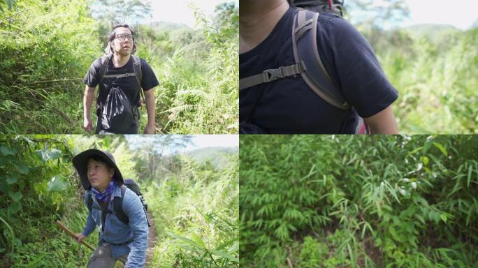 TS两名徒步旅行者在丛林小径上穿过摄像机