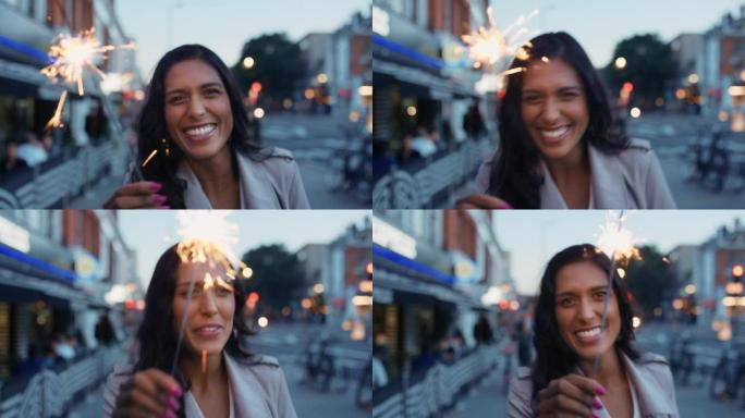 4k视频片段，一名年轻女子拿着烟火在城市外行走