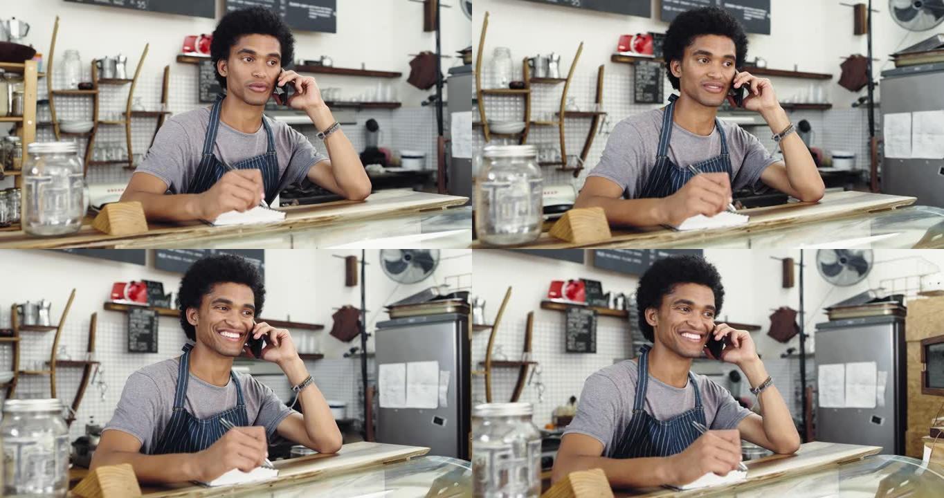 一名男子在咖啡店工作时打电话的4k录像