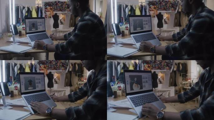 Man在工作室的笔记本电脑上开发3D衣服设计