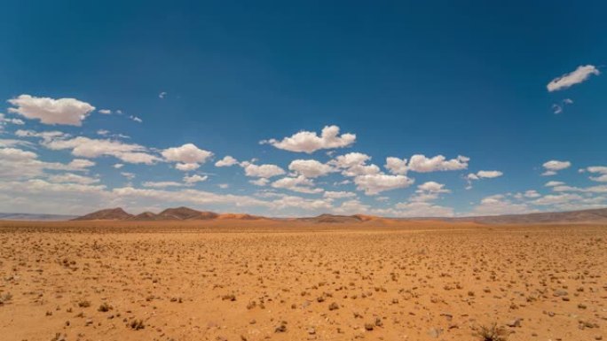 非洲纳米比亚阳光明媚的沙漠景观上的WS延时云层