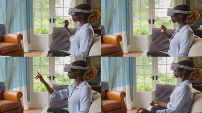 女人看着投影屏幕坐在家里的沙发上戴着使用AR技术的VR耳机