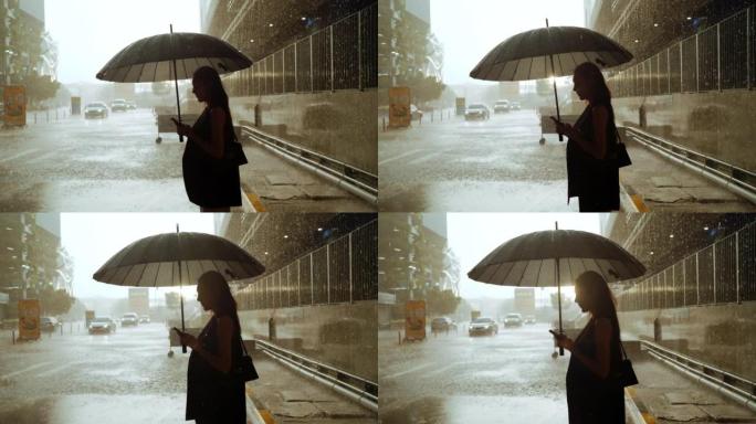 女商人在雨中撑伞时感到难过