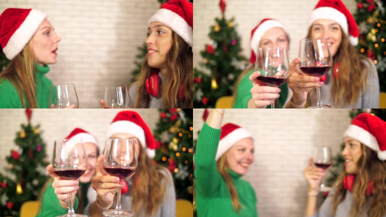 圣诞晚宴上喝红酒的快乐朋友