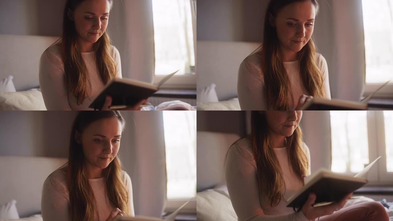 女人在日记中写作实拍视频素材宣传片