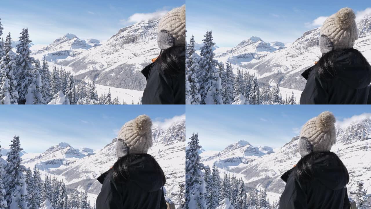 女人享受户外冒险看远山大气看雪山