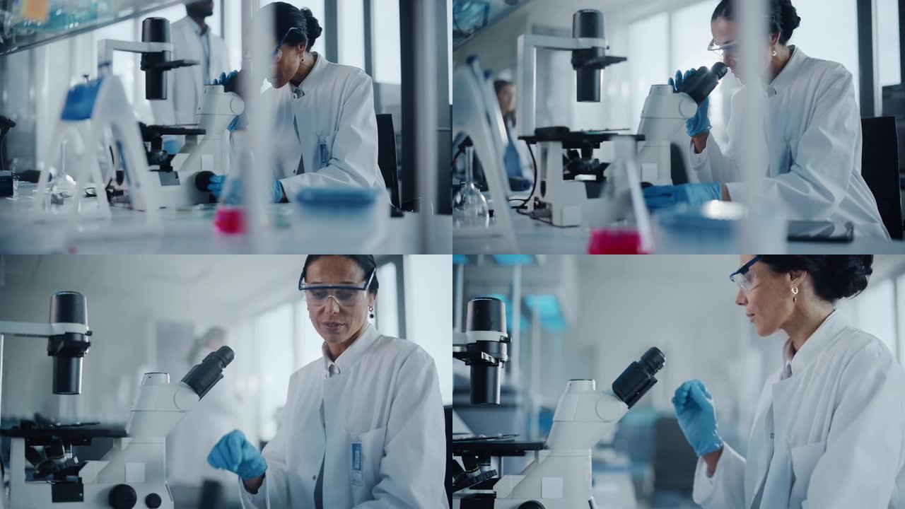 医学发展实验室: 高加索女科学家在显微镜下观察，分析培养皿样品。高级实验室从事医学、生物技术研究的专