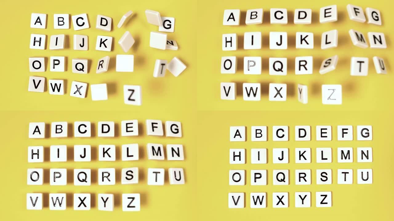 黄色表面弹起并显示字母的塑料字母