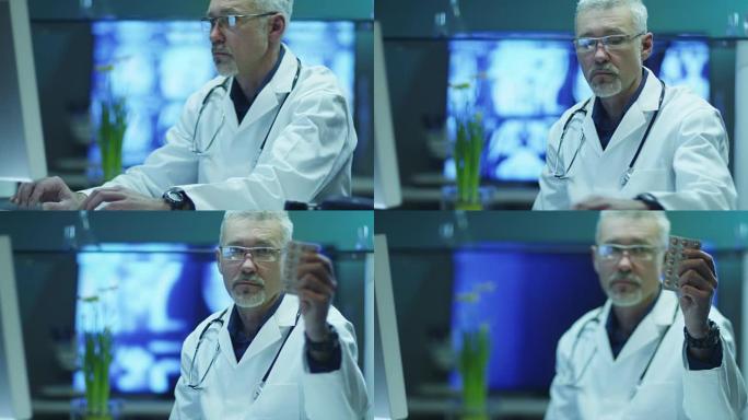 医生正在电脑上写药方，并显示药片包。在4k (UHD) 的红色电影相机上拍摄。