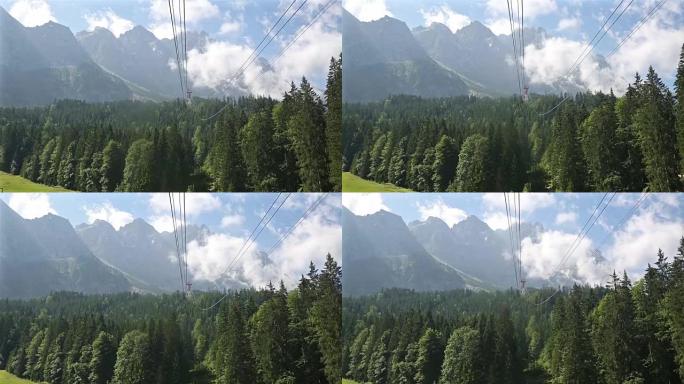 在德国阿尔卑斯山脉上乘坐缆车