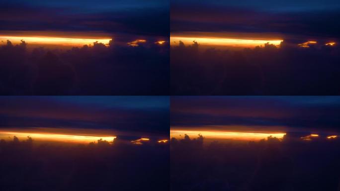 复制空间: 浮云和紫色的天空掩盖了风景如画的橙色日出。