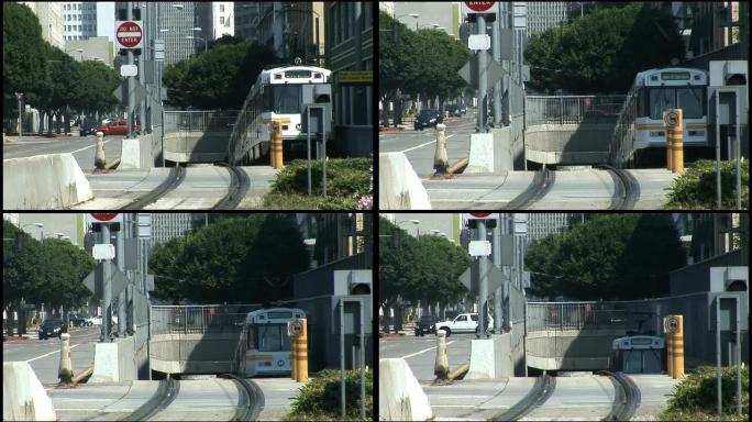 （HD1080i）洛杉矶：地铁列车从街上消失在隧道中