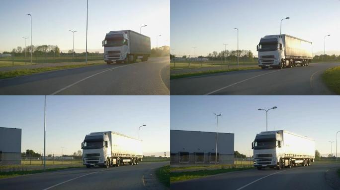 半卡车，载货拖车在高速公路上行驶。白色卡车通过工业仓库区运输货物。