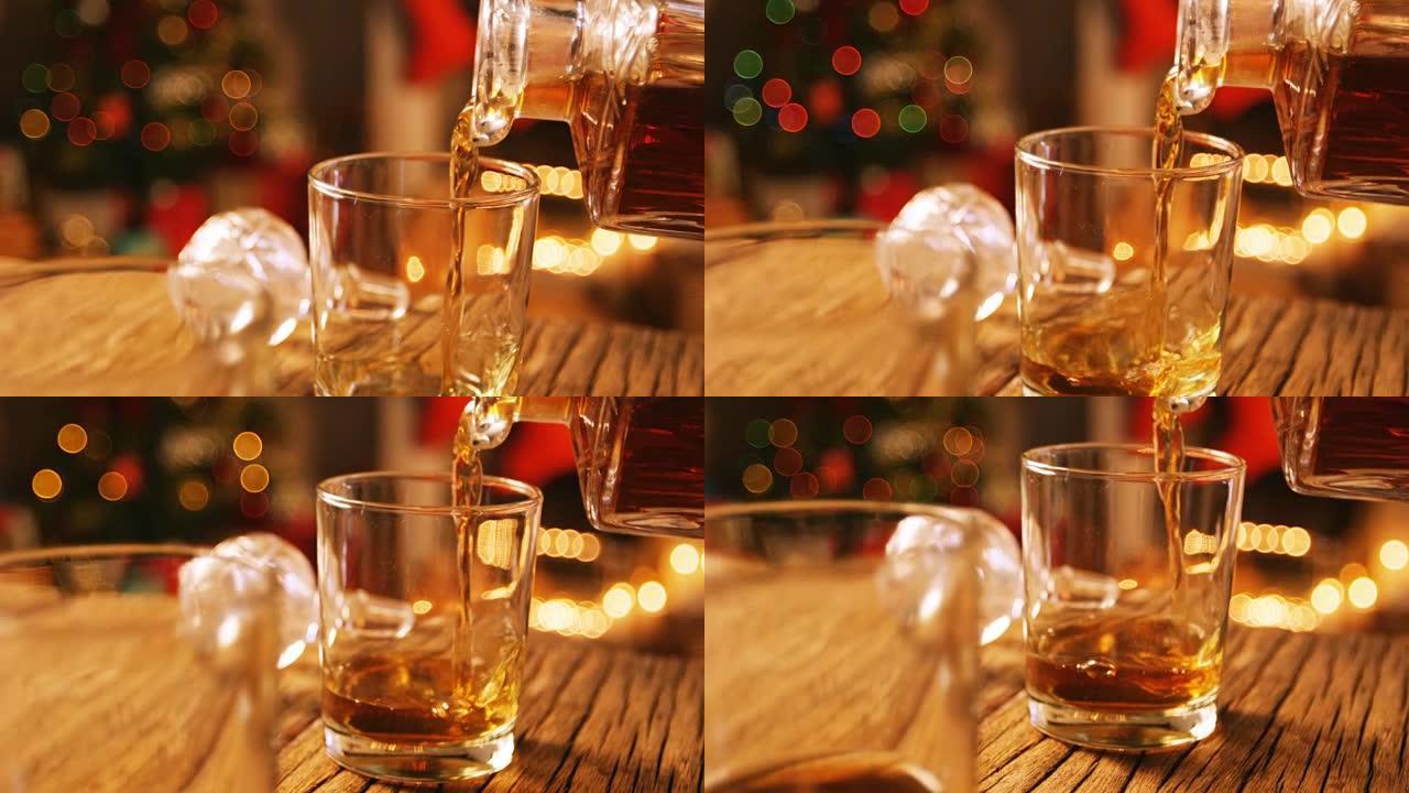 威士忌倒入玻璃杯中