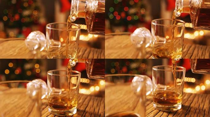 威士忌倒入玻璃杯中