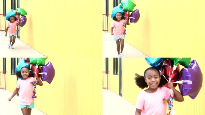 混血女孩带着一堆气球跑过