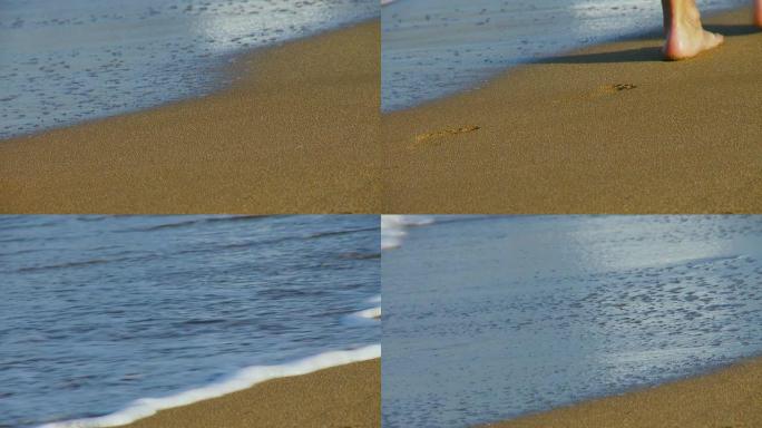 沙滩上的脚印然后被冲走-全高清