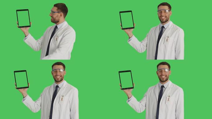 一位英俊的科学家戴着防护眼镜，用一只手拿着平板电脑，用另一只手滑动触摸手势。平板电脑和背景是绿色屏幕