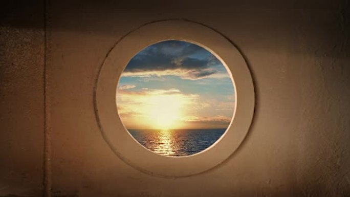 日落时从船上看到舷窗