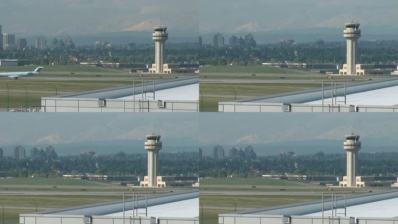 空中交通管制塔背景图中的Seq山脉和城市景观