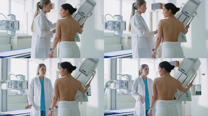 在医院，乳房x线摄影技术专家/医生为女性患者调整乳房x线照相机。友好的医生解释了乳腺癌预防筛查的重要
