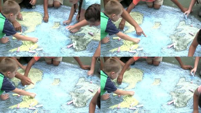 多民族儿童制作地球粉笔画