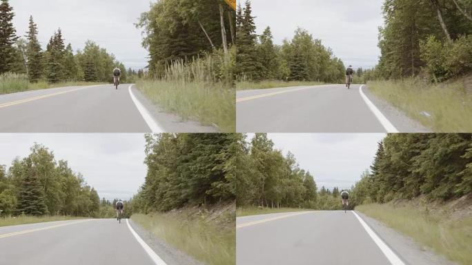 UHD 4K: 乡村道路上坚韧不拔的女自行车手训练