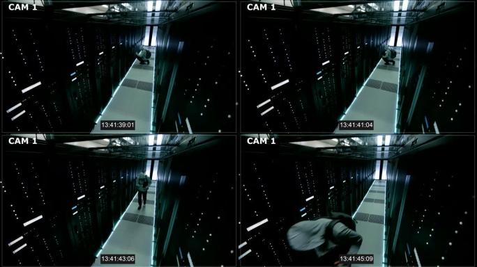 安全摄像头N1数据中心一名蒙面黑客的镜头，他用笔记本电脑连接到其中一台机架式服务器，犯罪并离开。