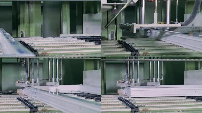 机器人生产机器加工PVC塑料窗户。4K。