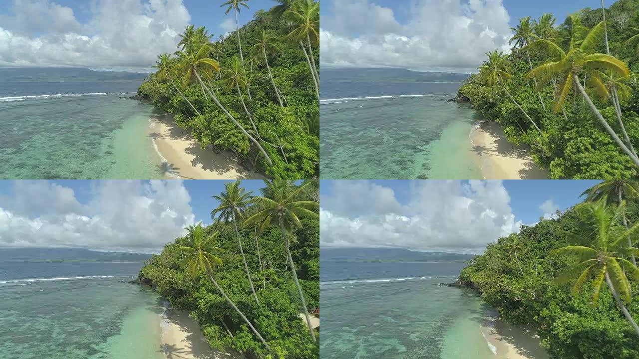 空中震撼的岛屿海岸线被棕榈树和沙滩覆盖