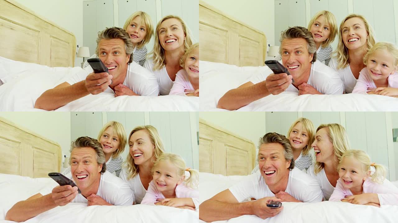 快乐的家庭在卧室看电视4k