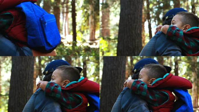 父亲在公园拥抱儿子