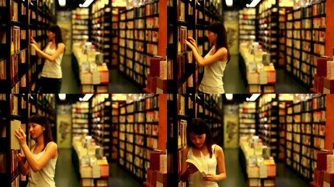 漂亮的年轻女子在图书馆找书