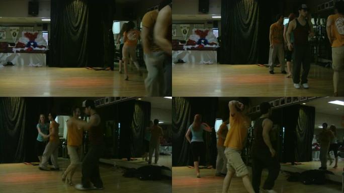 萨尔萨舞者在舞蹈工作室练习舞蹈。南美节奏。