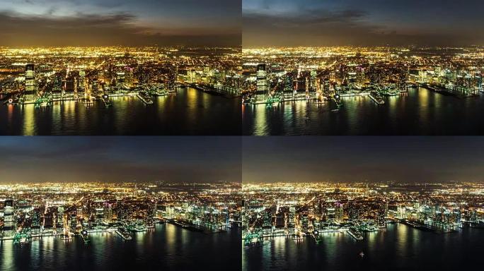 延时-新泽西州夜间泽西城天际线和哈德逊河的鸟瞰图 (PAN)