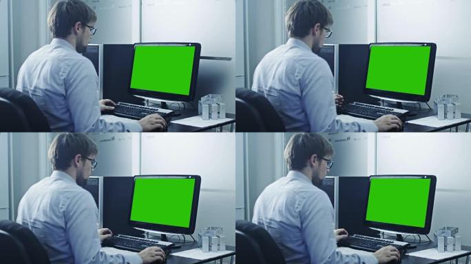 工程师正在研究计算机。绿屏显示。非常适合使用模型。