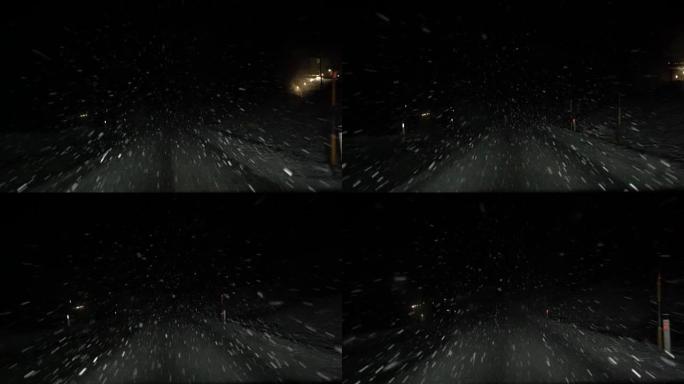FPV，慢动作: 夜间在雪堆中缓慢而谨慎地行驶的汽车