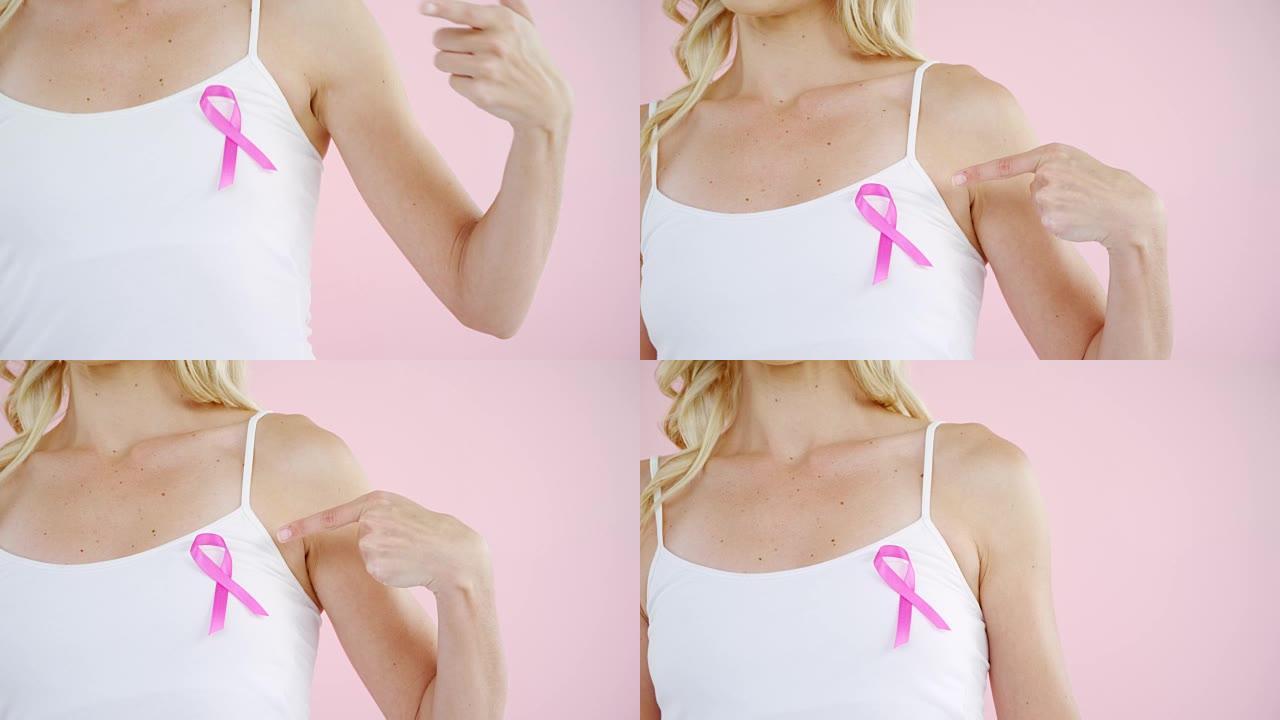 女性中段显示乳腺癌意识丝带